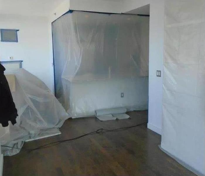 plastic containment setup during mold removal services in NJ