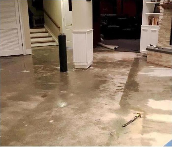 basement flooding and carpet removal during property restoration