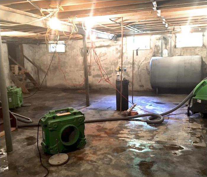 flooded basement in need of water extraction